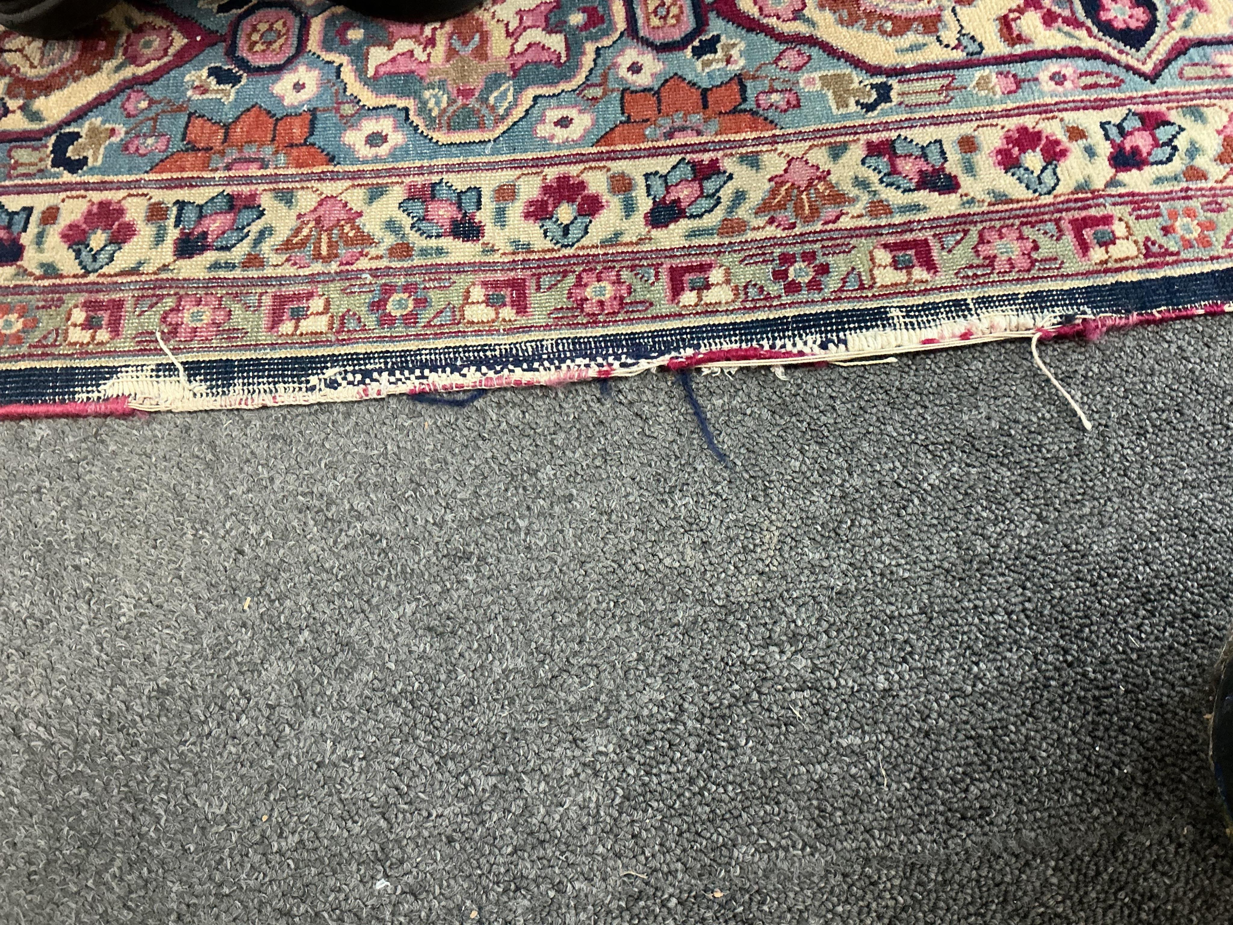 An early 20th century Kashan blue ground carpet, 315 x 206cm